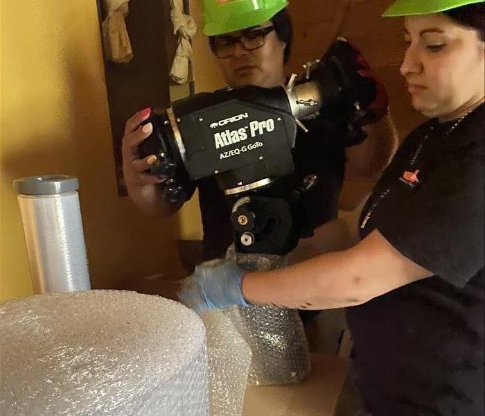 Using bubble wrap on cleaned items from a fire damage.
