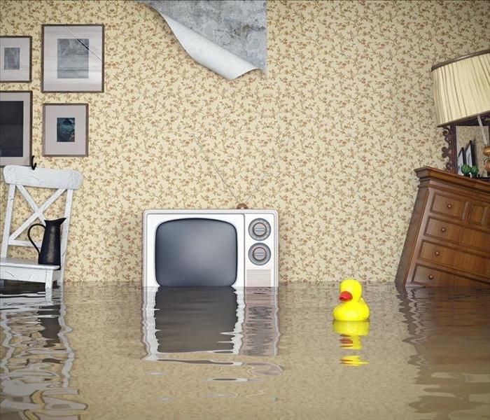 Image of a room full of water and personal belongings floating. 