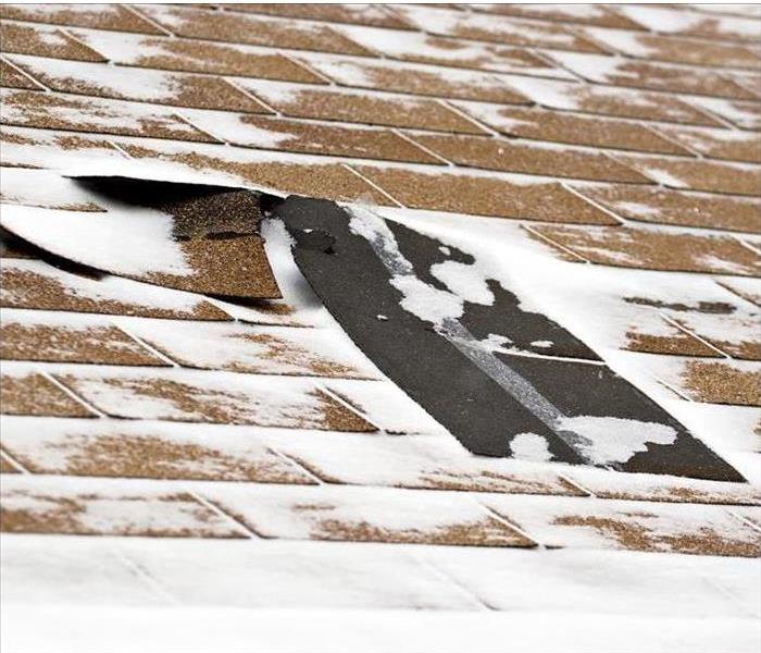 Roof damaged with snow 